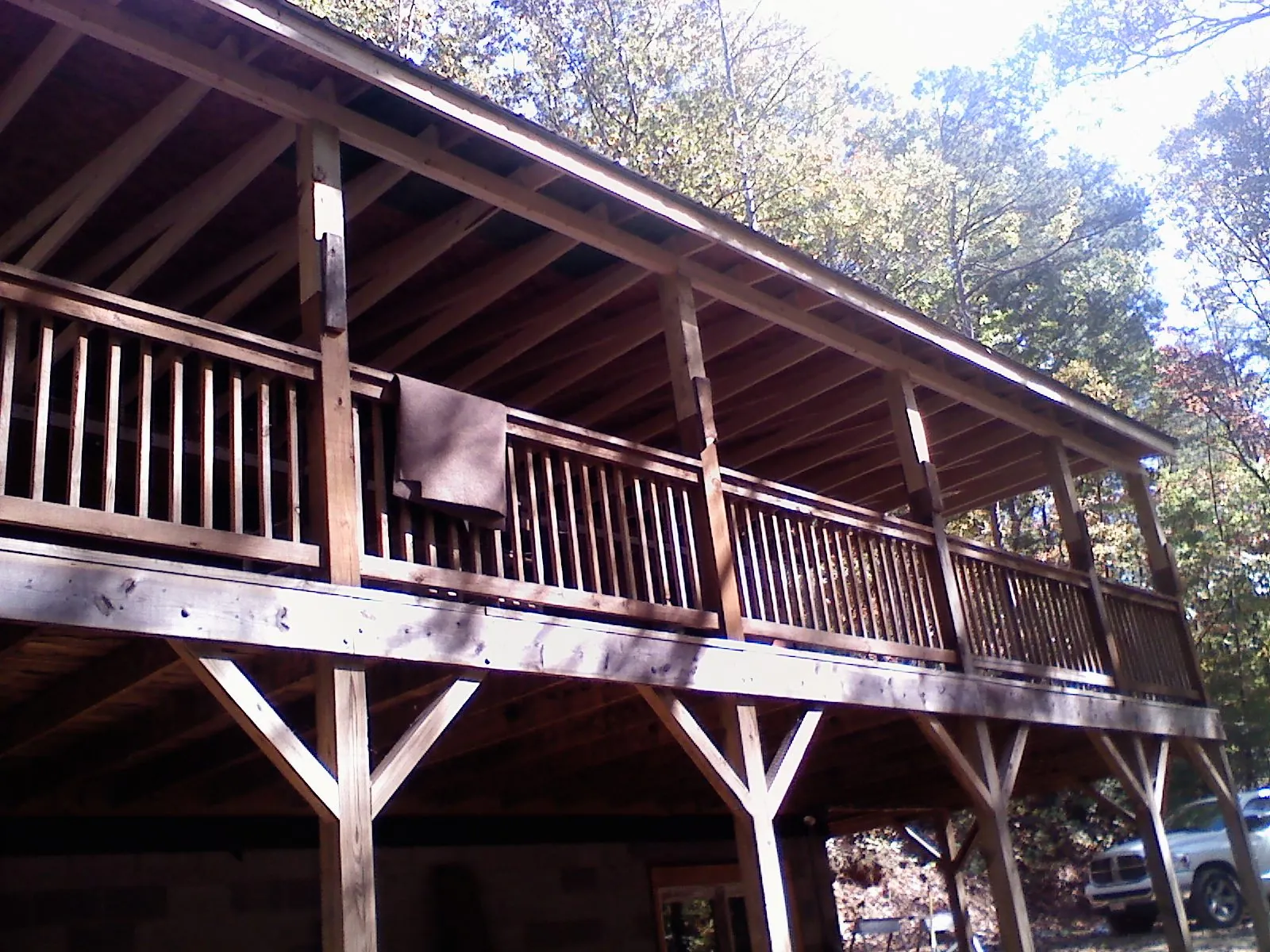 Timber framing under a new elevated porch and deck — Roof Leak Repair in Excelsior by Roofing Brothers